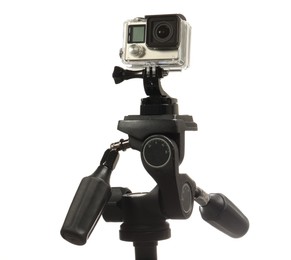 Photo of Modern action camera and stabilizer isolated on white