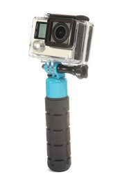 Photo of Modern action camera and monopod isolated on white