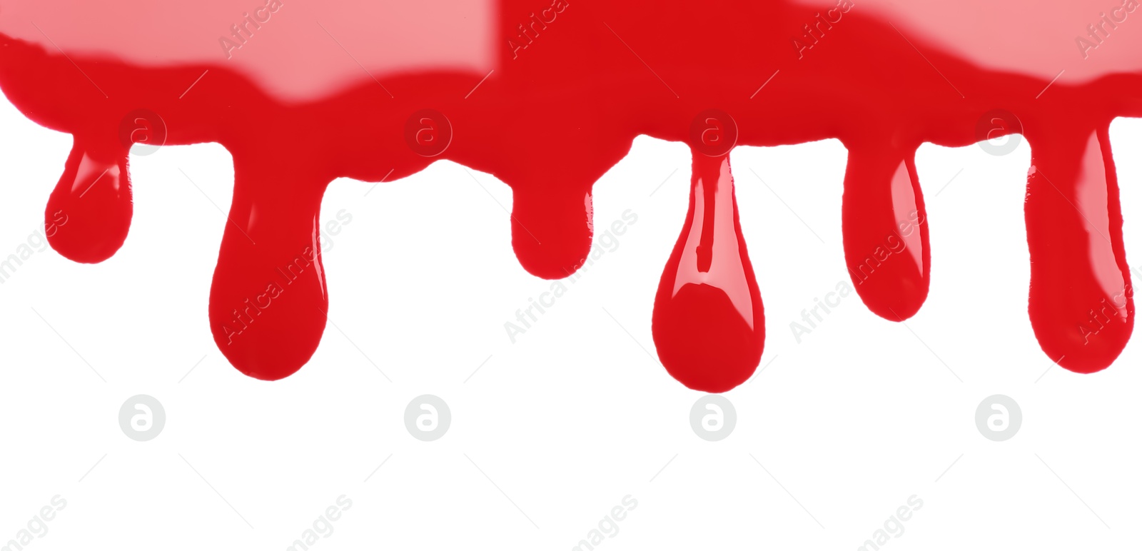 Photo of Sample of red printer ink isolated on white, top view