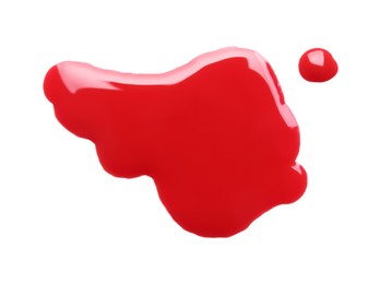 Blot of red printer ink isolated on white, top view