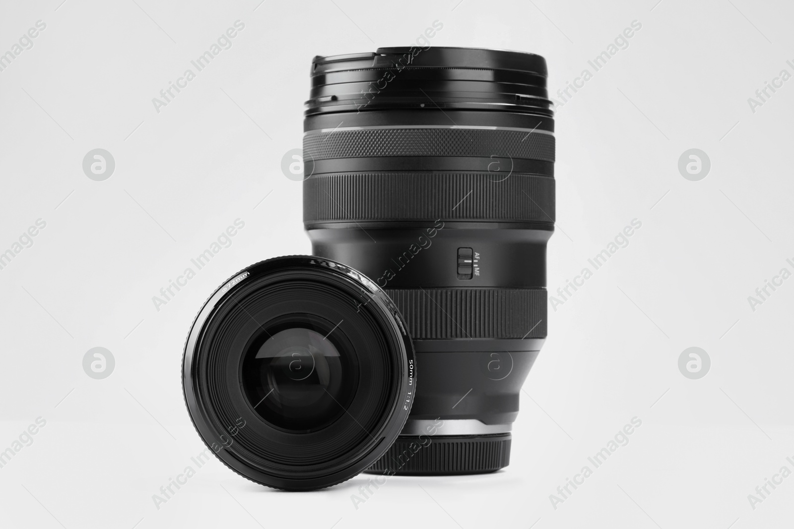 Photo of Camera lens on white background. Photographer's equipment