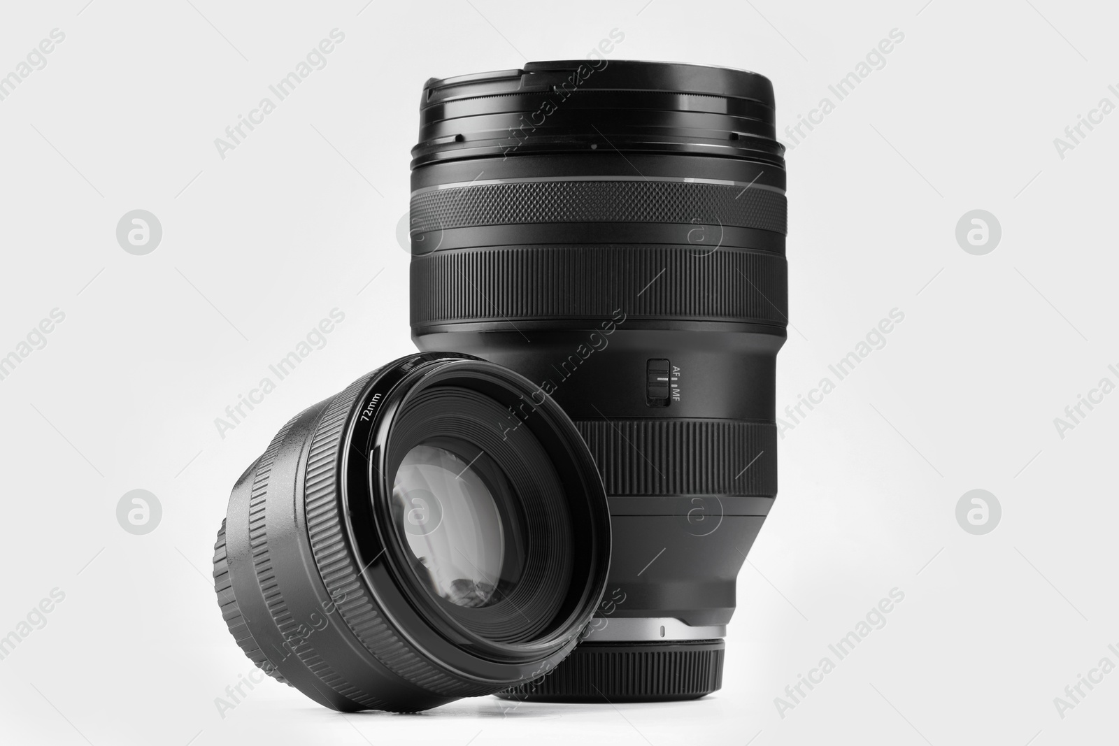 Photo of Camera lens on white background. Photographer's equipment