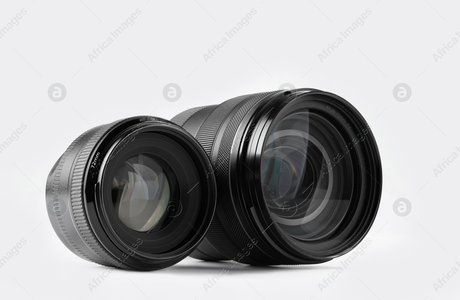 Photo of Camera lens on white background. Photographer's equipment