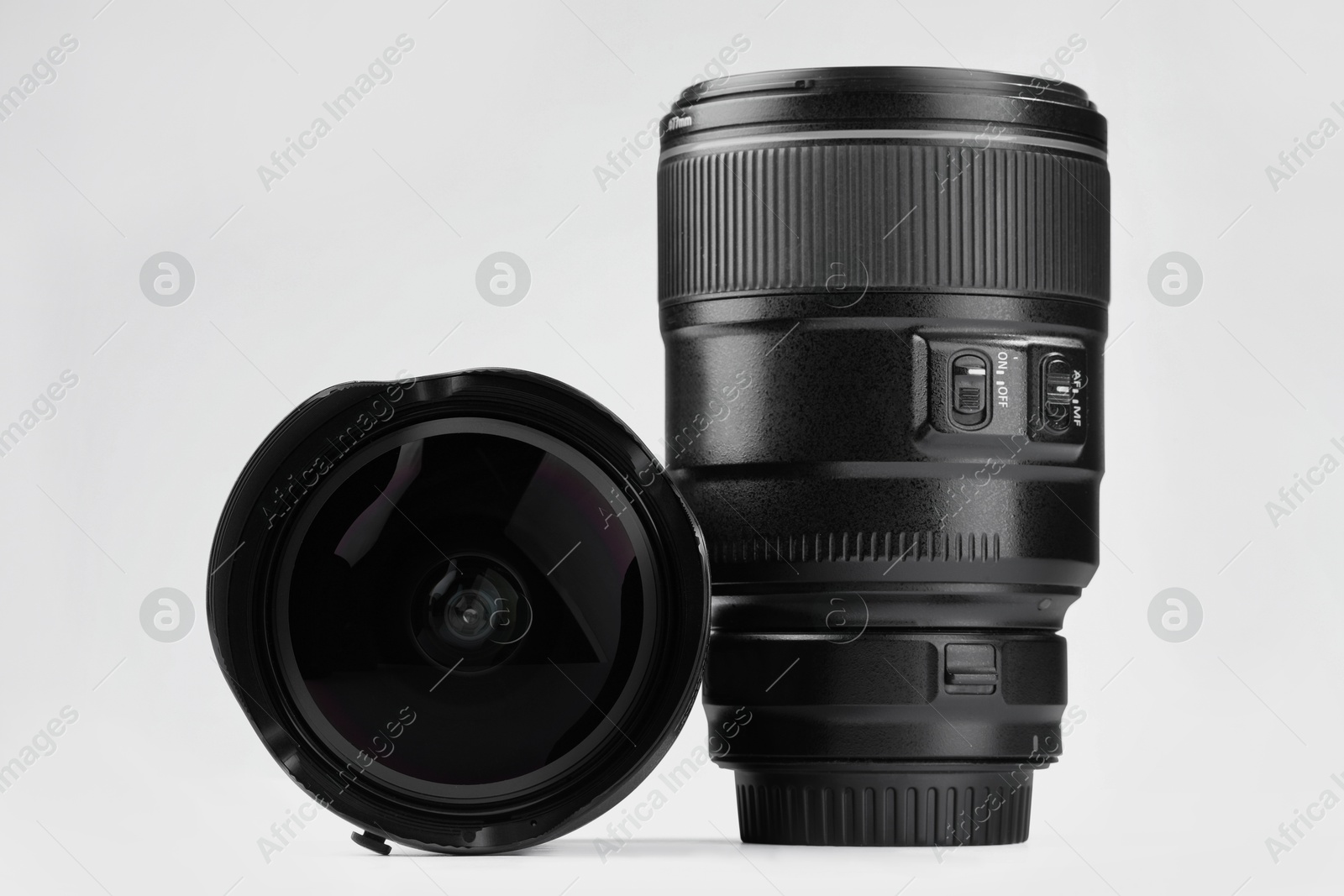 Photo of Camera lens on white background. Photographer's equipment