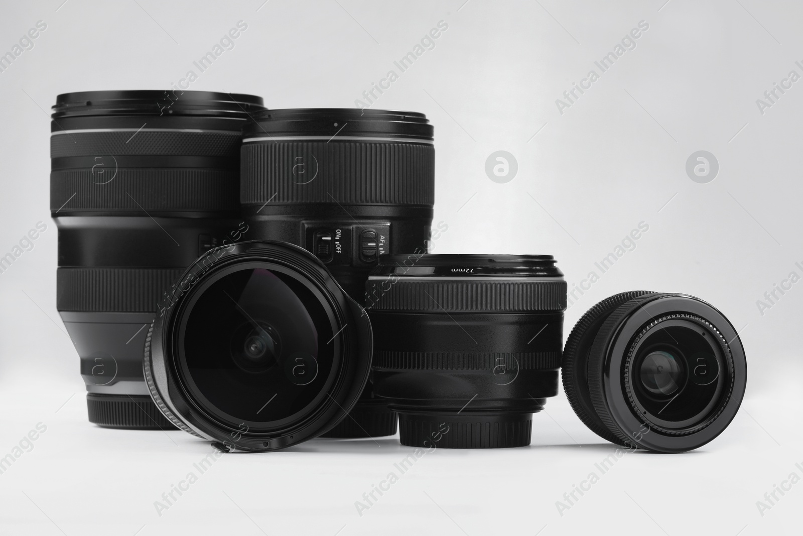 Photo of Camera lens on white background. Photographer's equipment