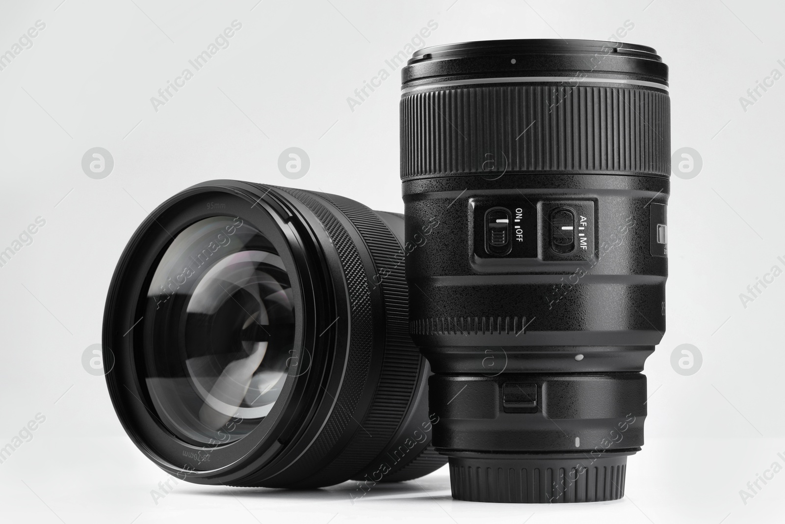 Photo of Camera lens on white background. Photographer's equipment