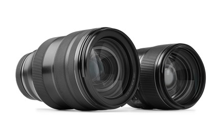 Camera lens isolated on white. Photographer's equipment