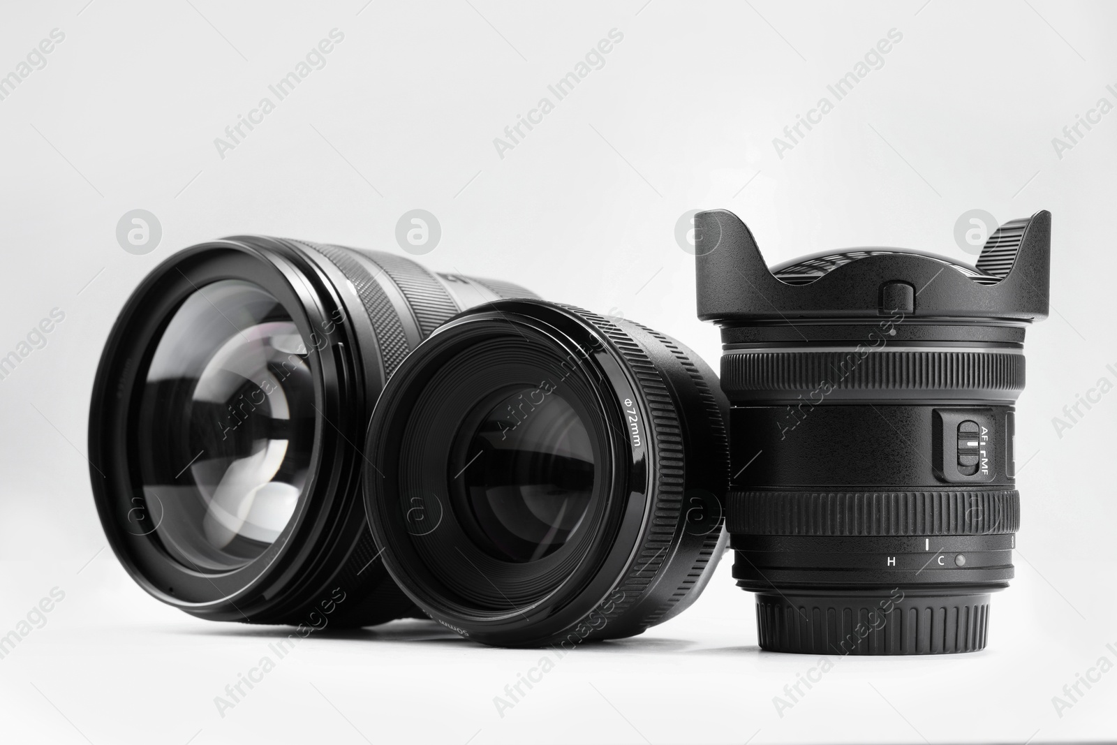 Photo of Camera lens on white background. Photographer's equipment