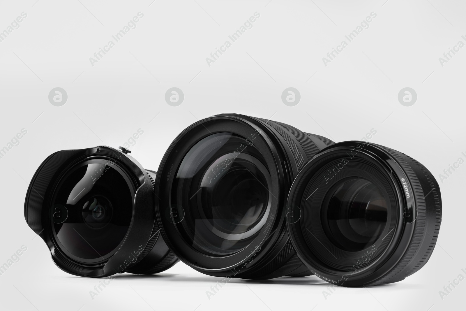 Photo of Camera lens on white background. Photographer's equipment