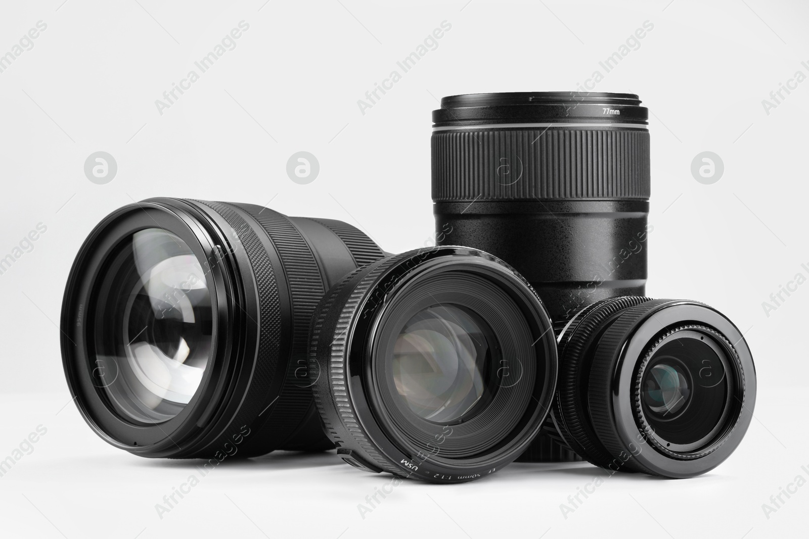 Photo of Camera lens on white background. Photographer's equipment