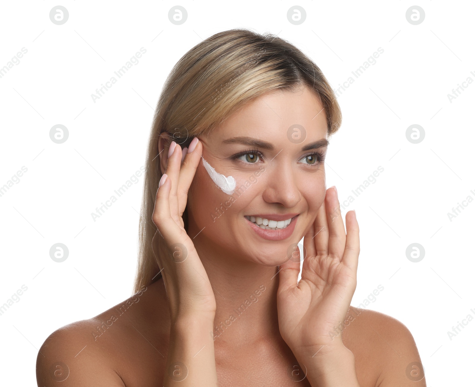 Photo of Beautiful woman with cream on her face against white background