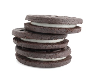 Photo of Three tasty sandwich cookies isolated on white