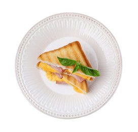 Pieces of toasted bread with melted cheese, ham and basil isolated on white, top view