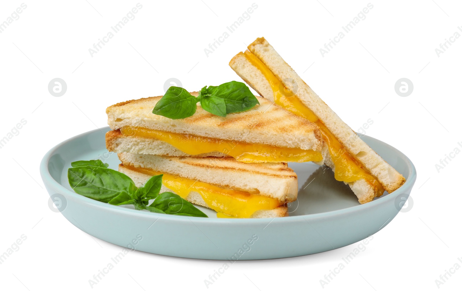 Photo of Pieces of toasted bread with melted cheese and basil isolated on white