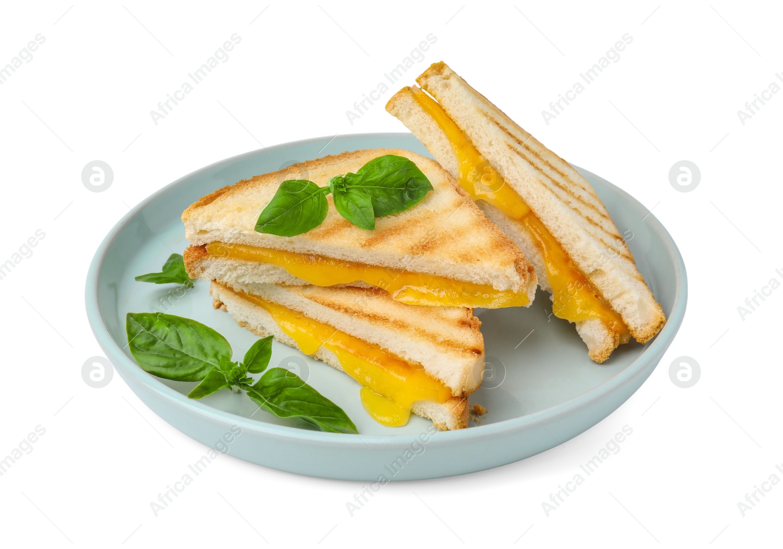 Photo of Pieces of toasted bread with melted cheese and basil isolated on white