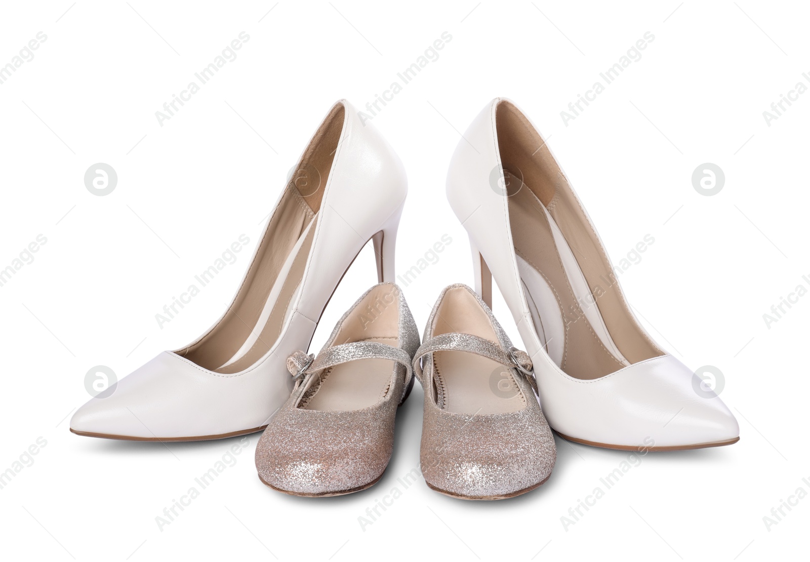 Photo of Big and small shoes isolated on white