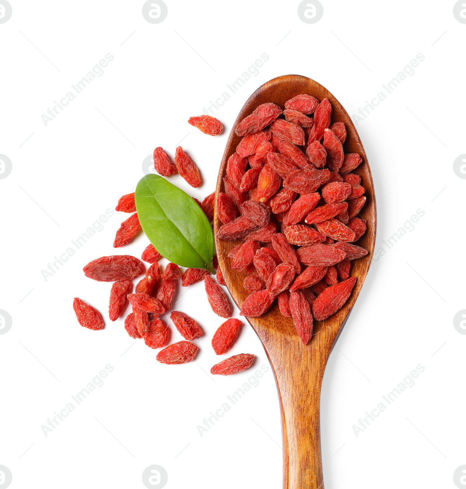 Photo of Dried goji berries, leaf and spoon isolated on white, top view