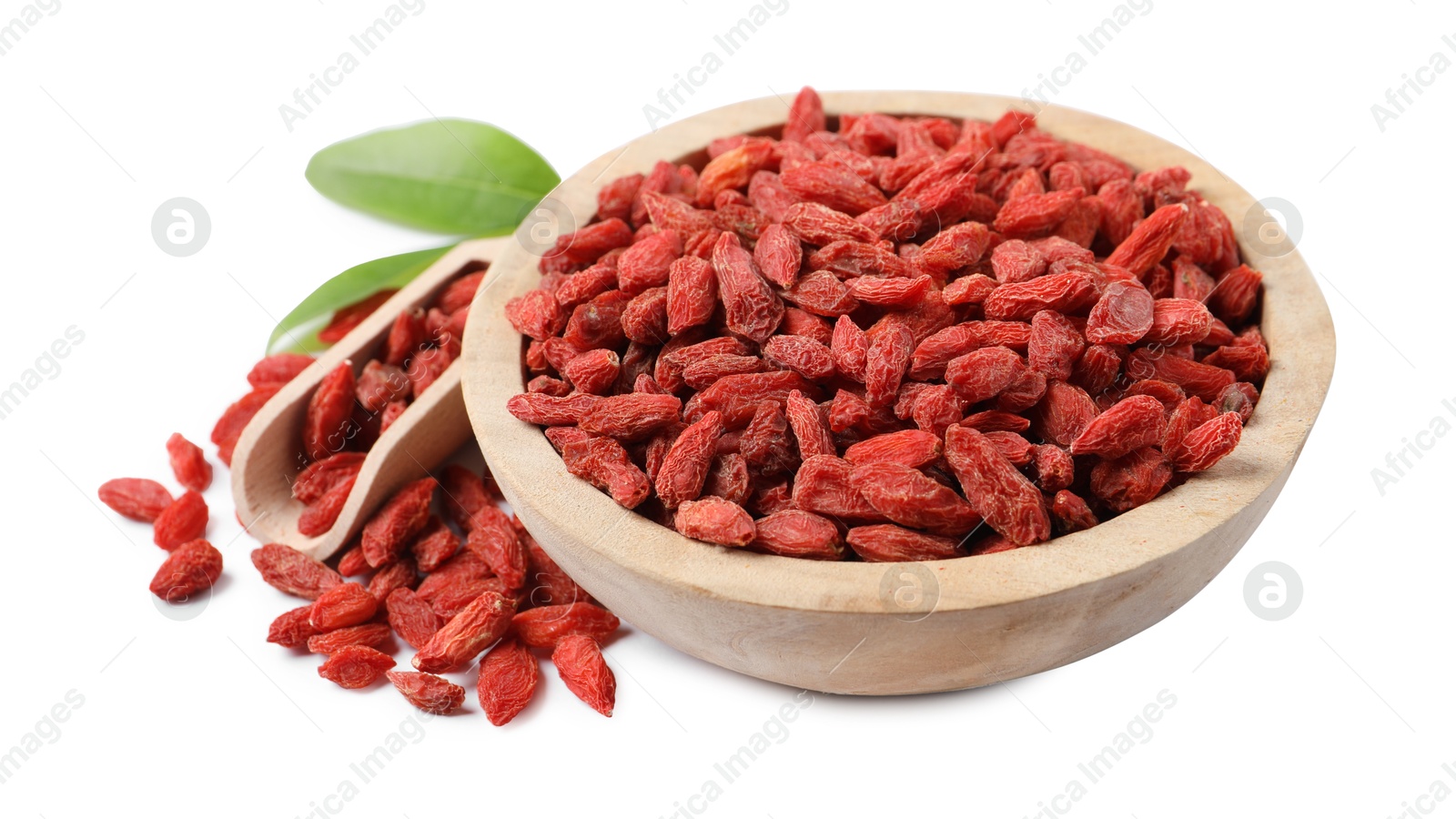 Photo of Bowl and scoop with dried goji berries isolated on white