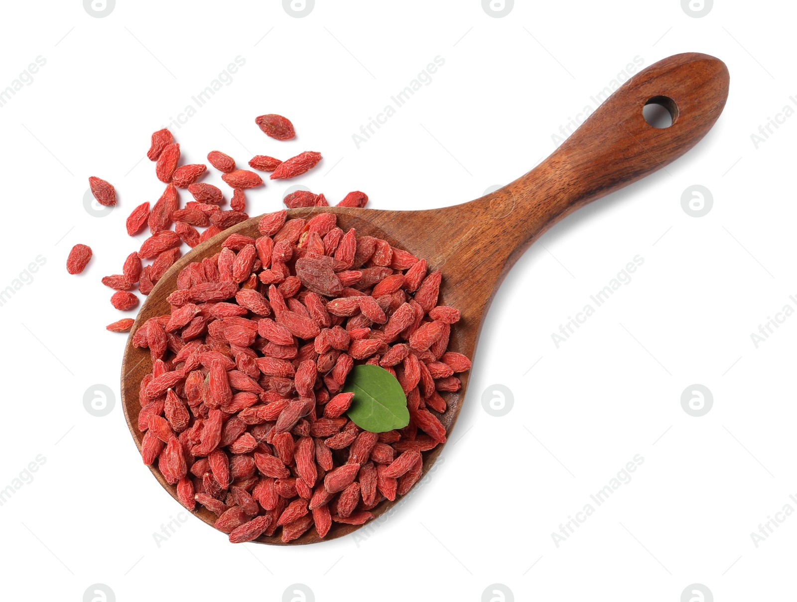 Photo of Spoon with dried goji berries isolated on white, top view