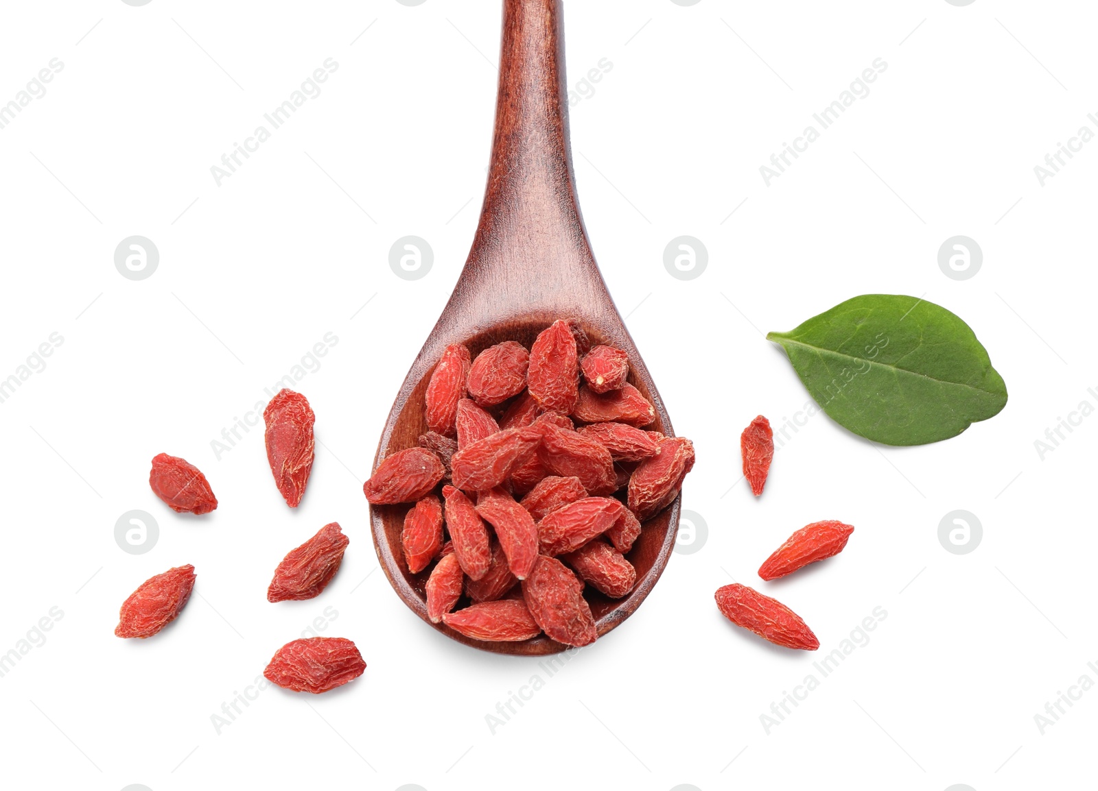 Photo of Spoon with dried goji berries and leaf isolated on white, top view