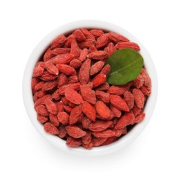 Photo of Dried goji berries and leaf in bowl isolated on white, top view