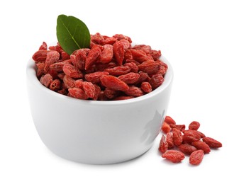 Photo of Dried goji berries in bowl isolated on white