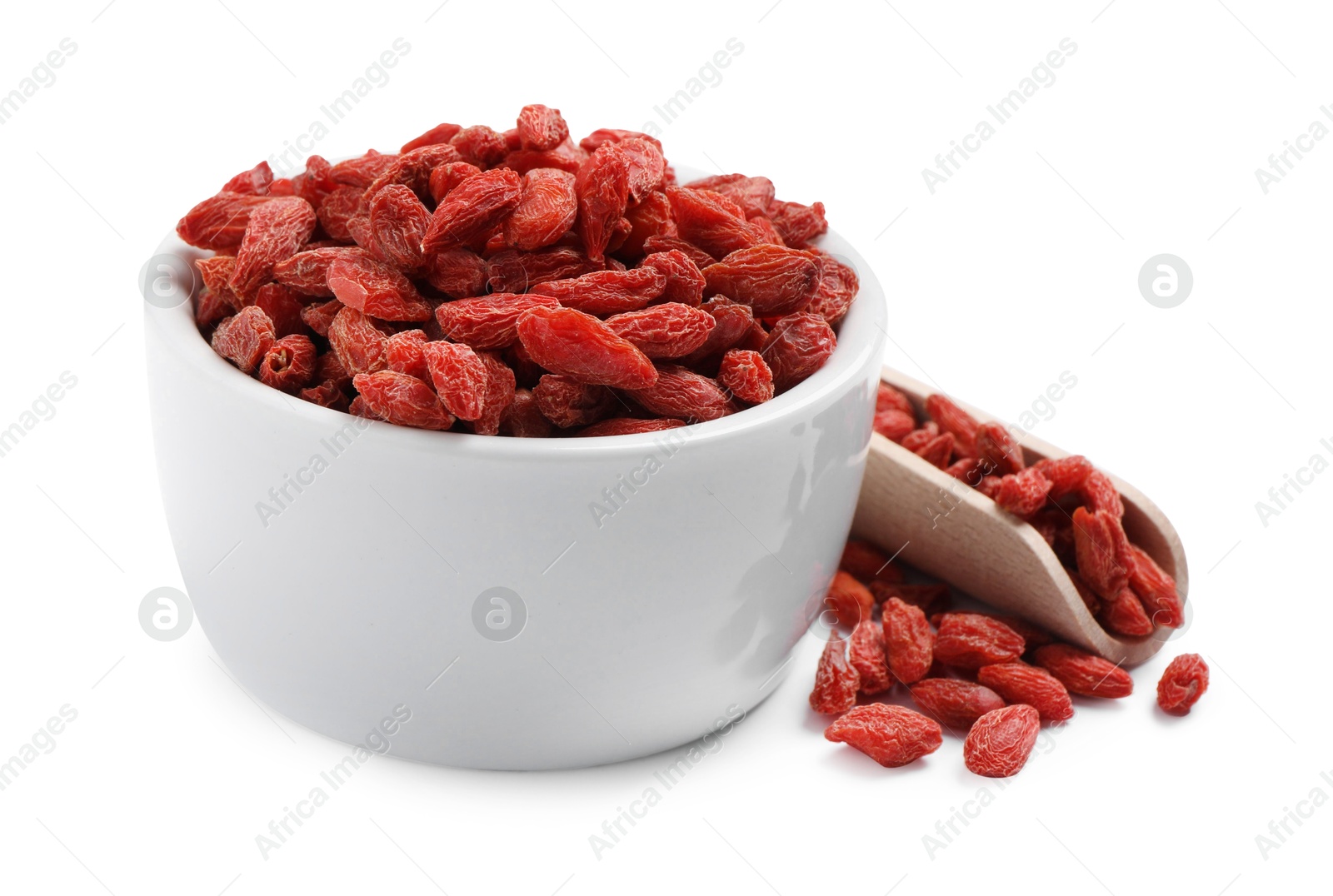 Photo of Dried goji berries in bowl and scoop isolated on white