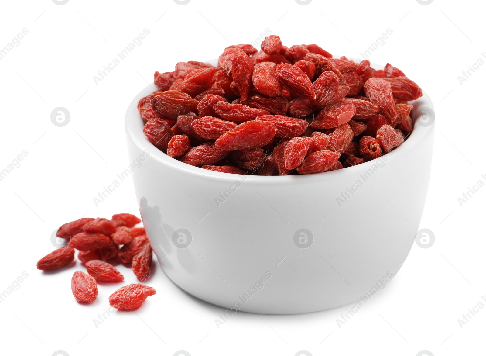 Photo of Dried goji berries in bowl isolated on white