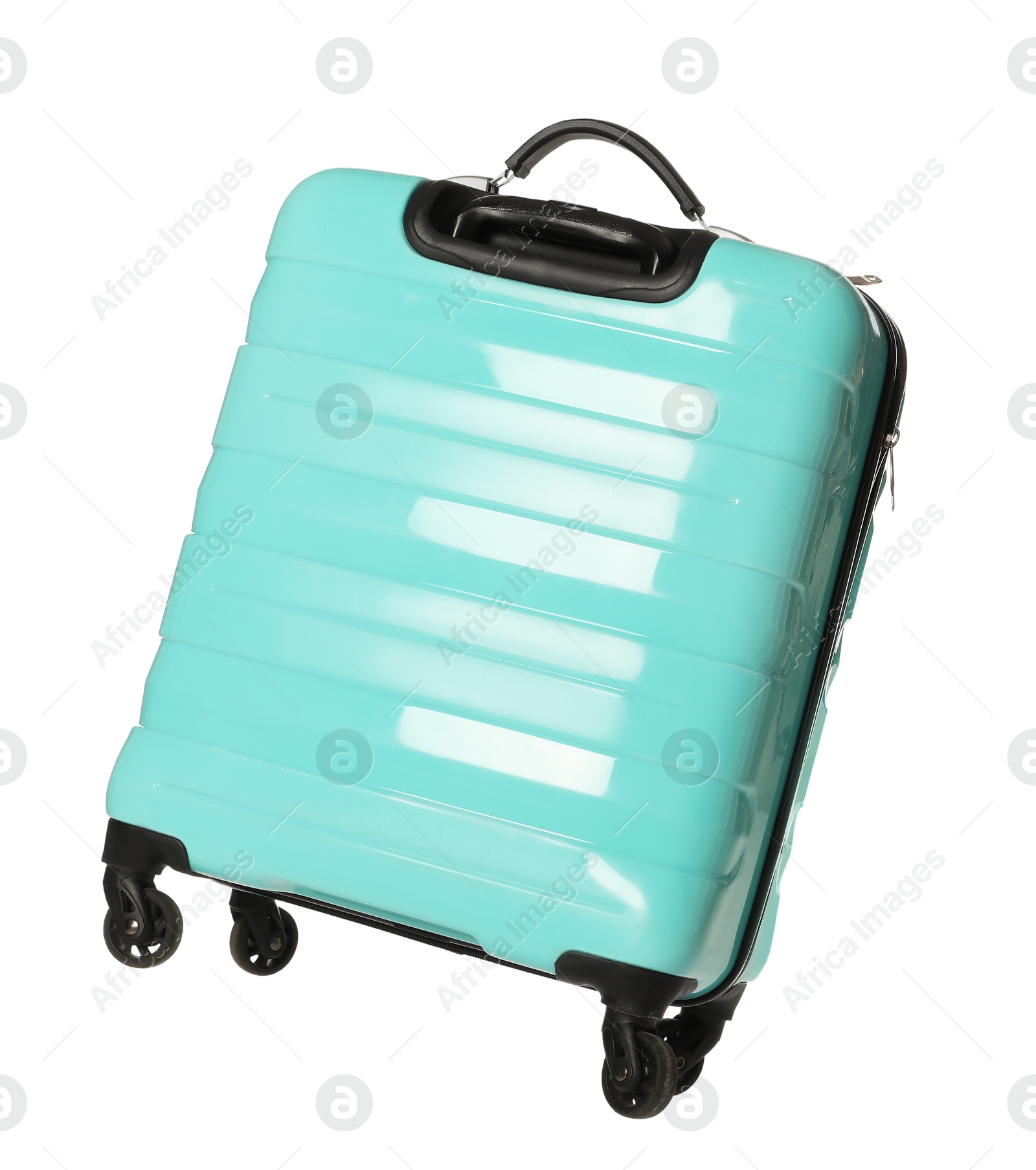 Photo of One new turquoise suitcase isolated on white