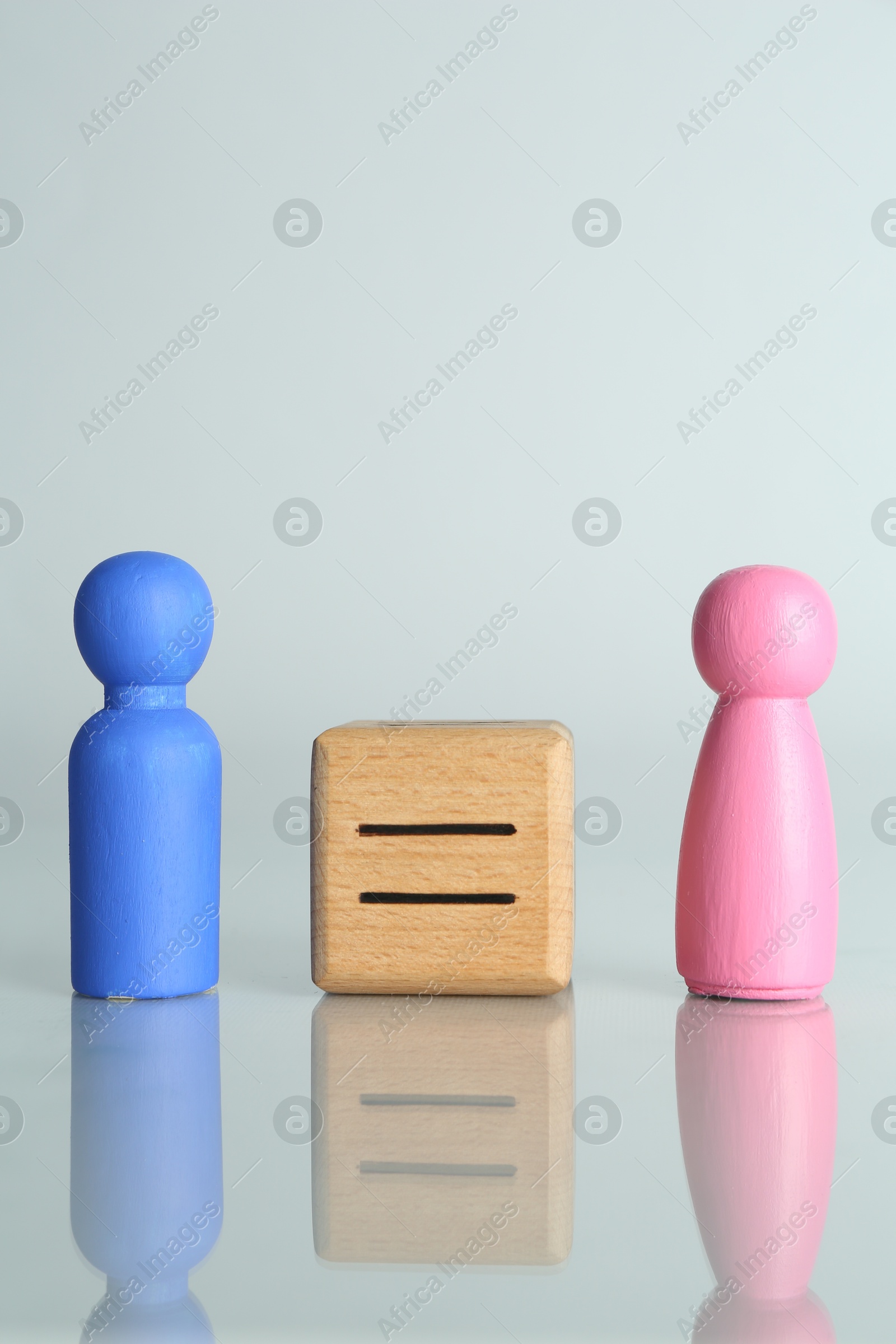 Photo of Gender equality concept. Male and female figures on light background