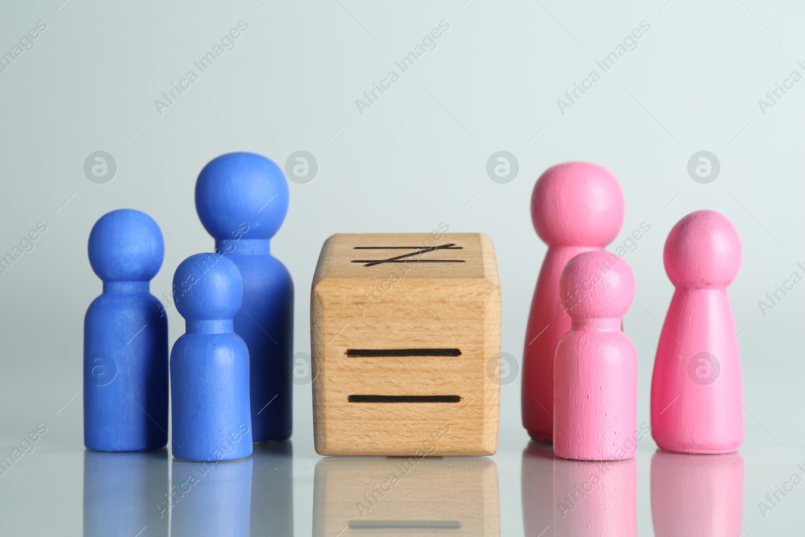 Photo of Gender equality concept. Male and female figures on light background