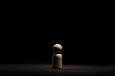 Photo of Loneliness concept. Human figure in darkness alone