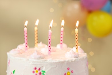 Tasty Birthday cake with burning candles against blurred background, closeup