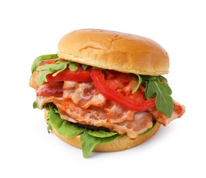 Delicious burger with bacon, tomato and greens isolated on white