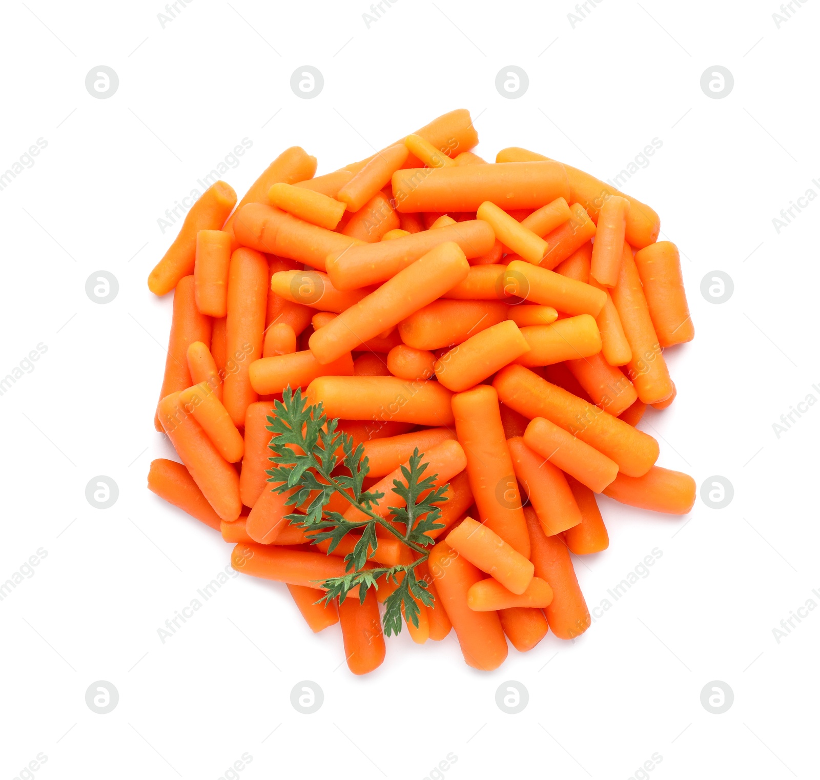 Photo of Pile of baby carrots and green leaf isolated on white, top view