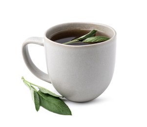 Photo of Aromatic herbal tea in cup with sage isolated on white