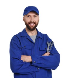 Professional auto mechanic with tools on white background