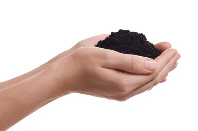 Photo of Woman holding pile of soil on white background, closeup