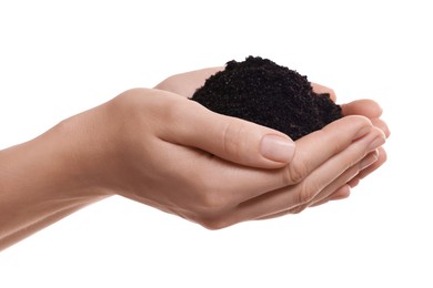 Woman holding pile of soil on white background, closeup