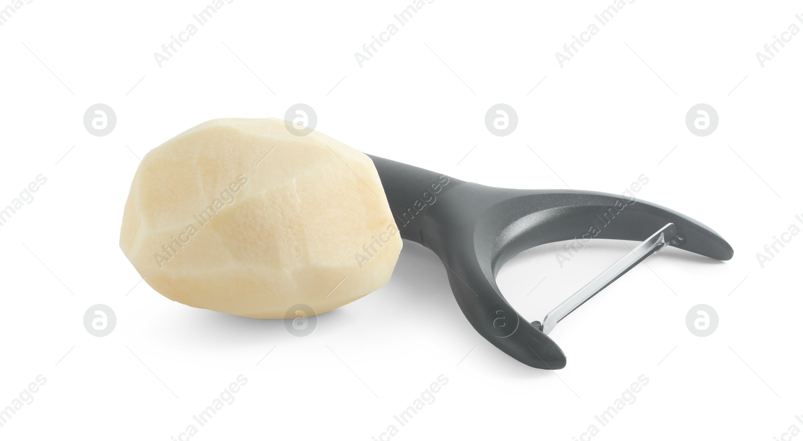 Photo of Fresh raw potato and peeler isolated on white