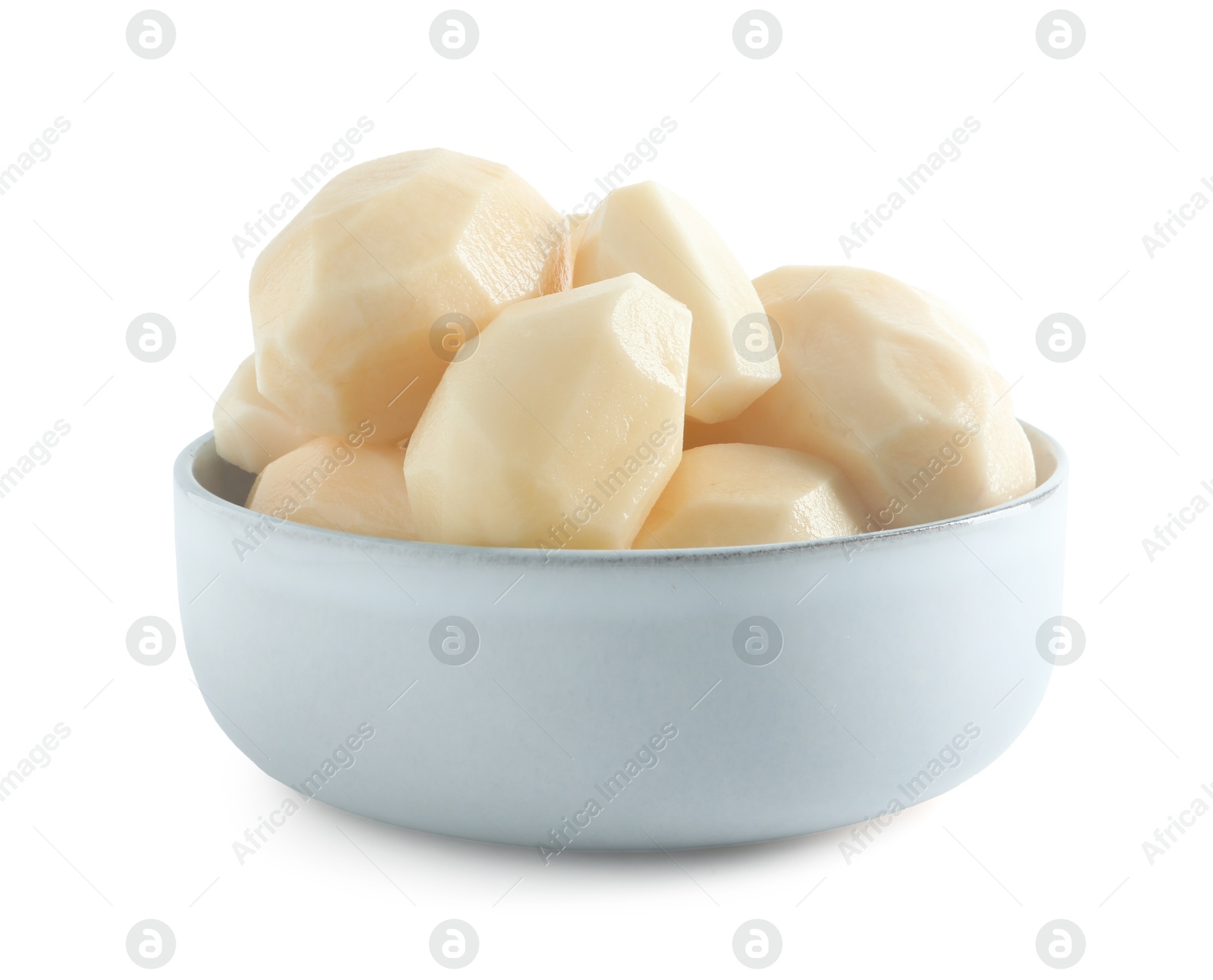 Photo of Fresh raw potatoes in bowl isolated on white