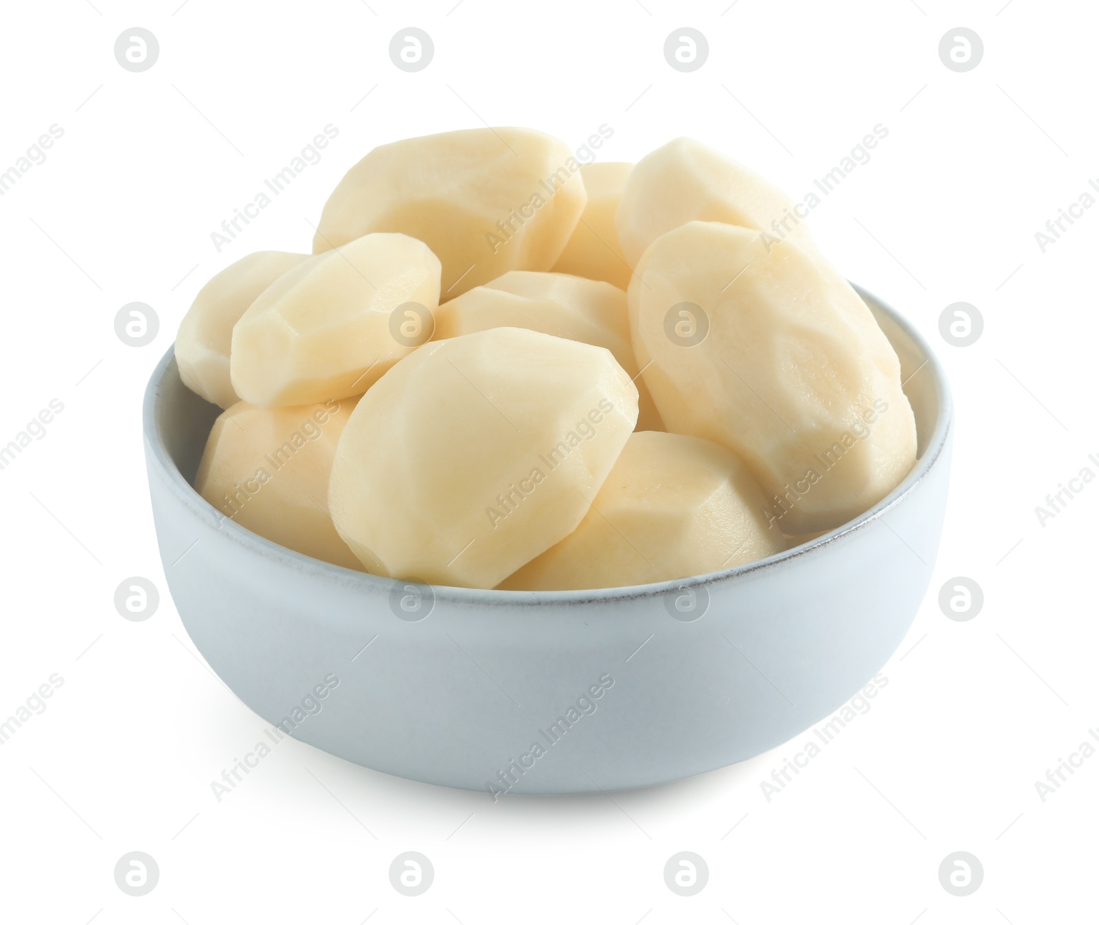 Photo of Fresh raw potatoes in bowl isolated on white