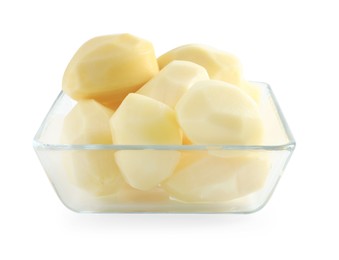 Photo of Fresh raw potatoes in glass bowl isolated on white