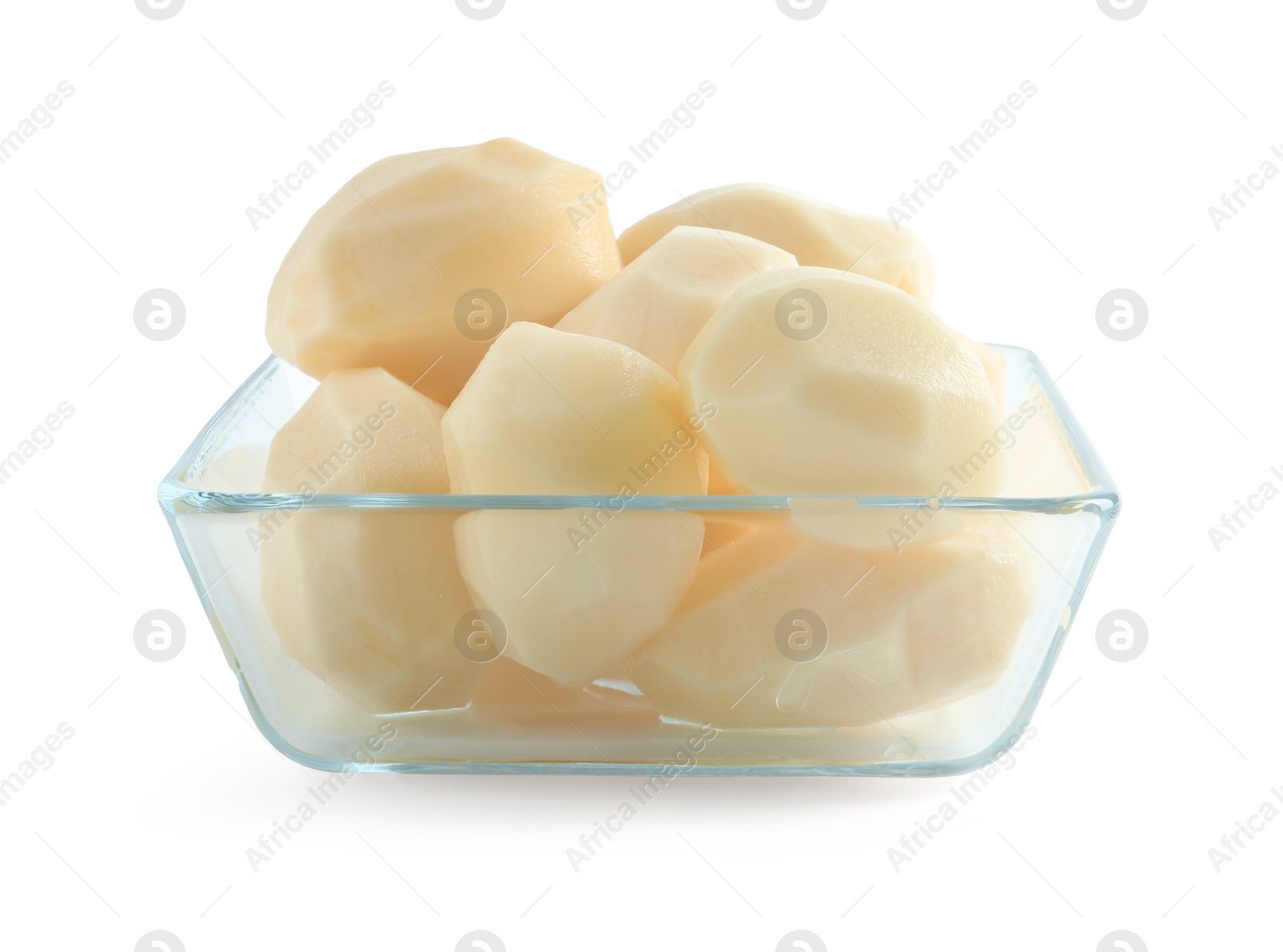 Photo of Fresh raw potatoes in glass bowl isolated on white