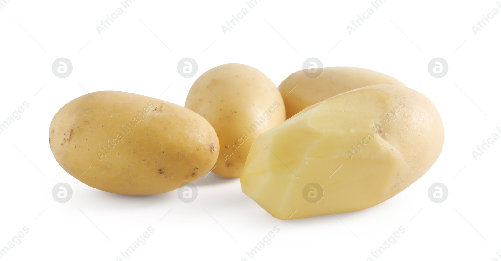 Photo of Many fresh raw potatoes isolated on white