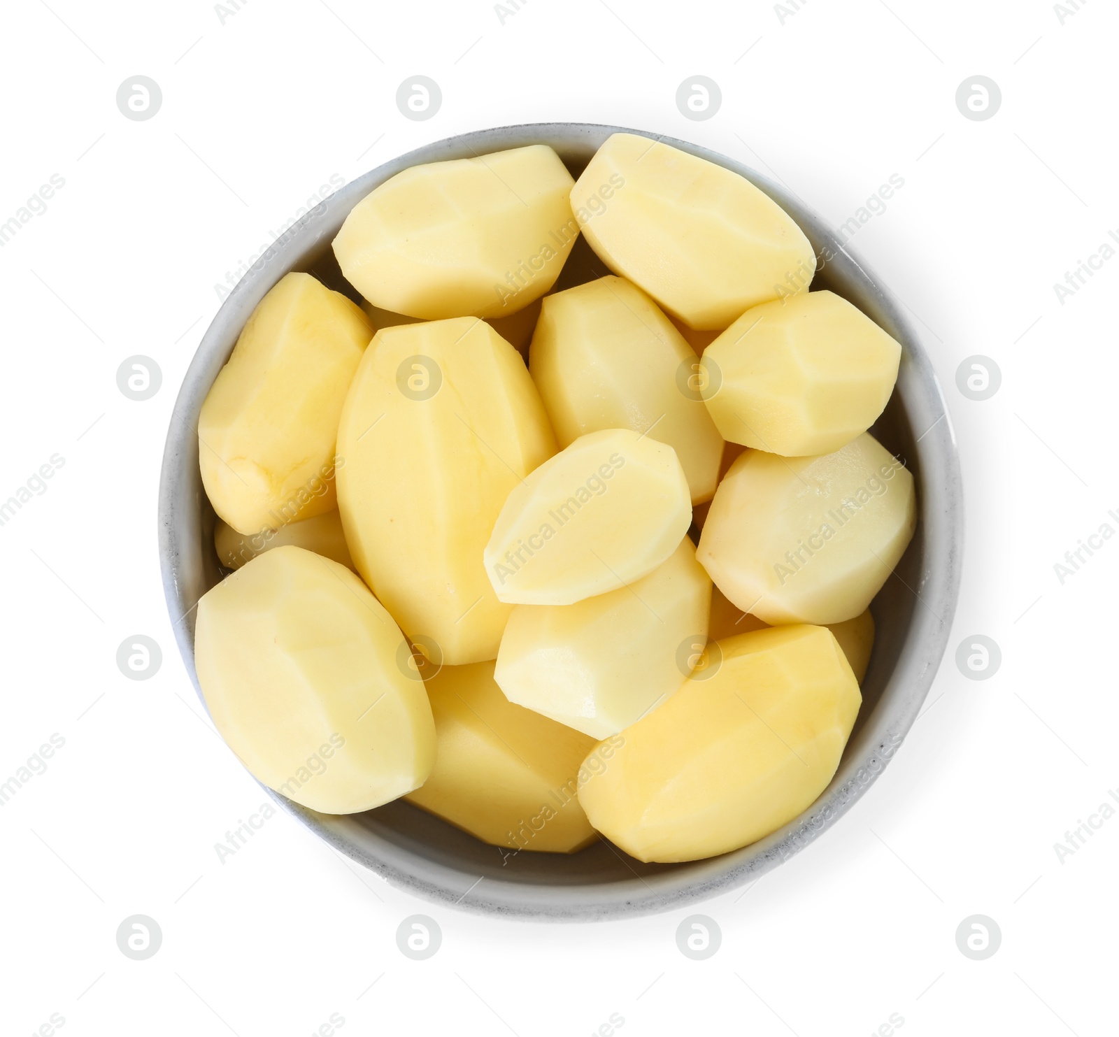 Photo of Fresh raw potatoes in bowl isolated on white, top view