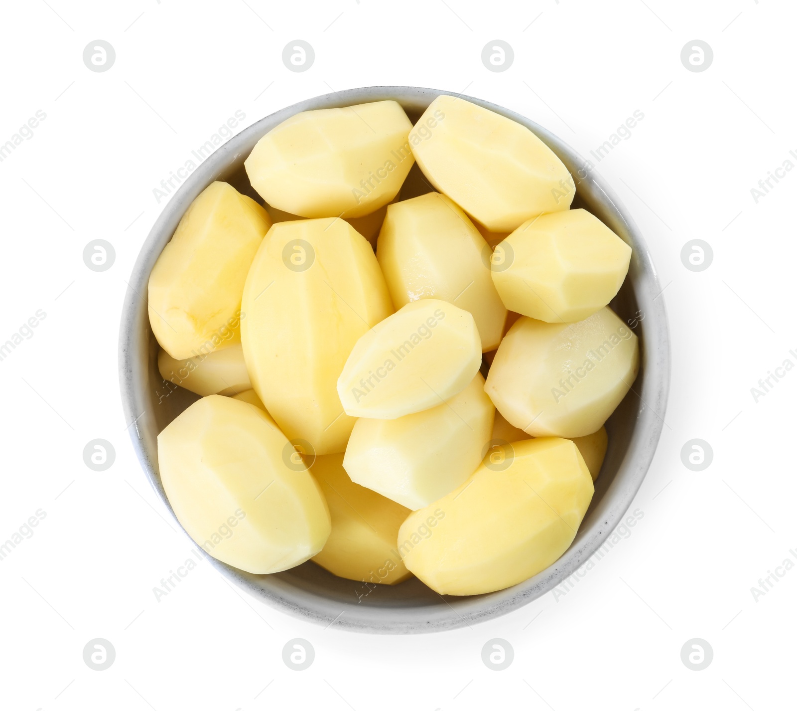 Photo of Fresh raw potatoes in bowl isolated on white, top view