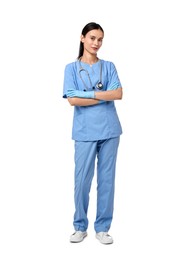 Photo of Beautiful nurse with crossed arms on white background