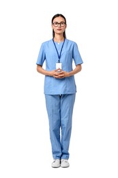 Beautiful nurse in uniform on white background