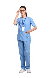 Photo of Smiling nurse in uniform on white background